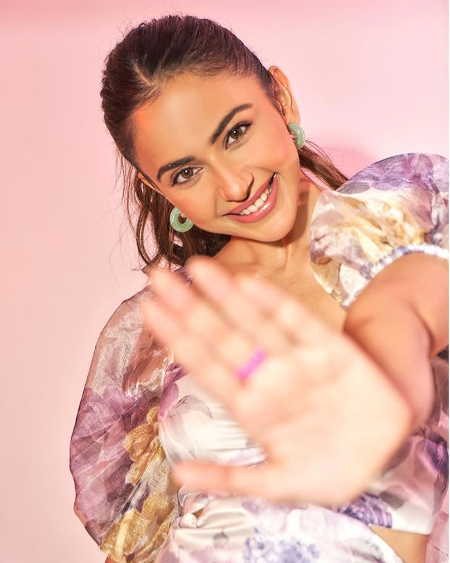 Funky Poses Of Rakul Preet Singh In Colorful Outfit